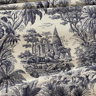 Toile cotton linen fabric with elephants and palm trees close-up